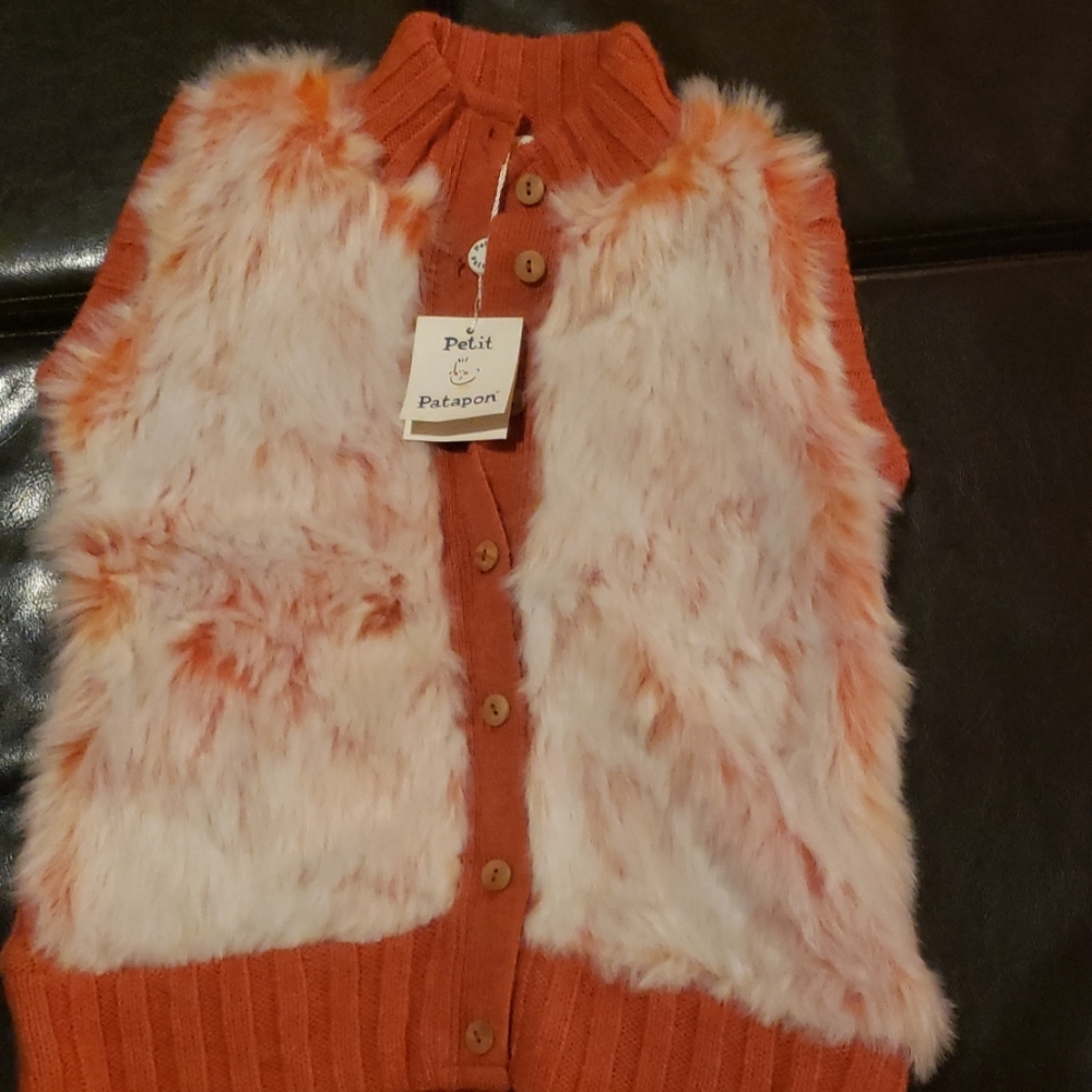 Great white and orange fur vest
